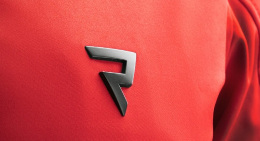 Close-up of a logo on a red background
